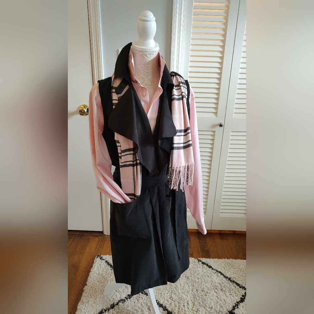 Pink shirt with black vest wrap. Pink and black scarf